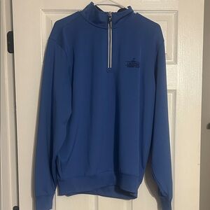 Fairway and Greene Blue Half-Zip does have a country club logo on it